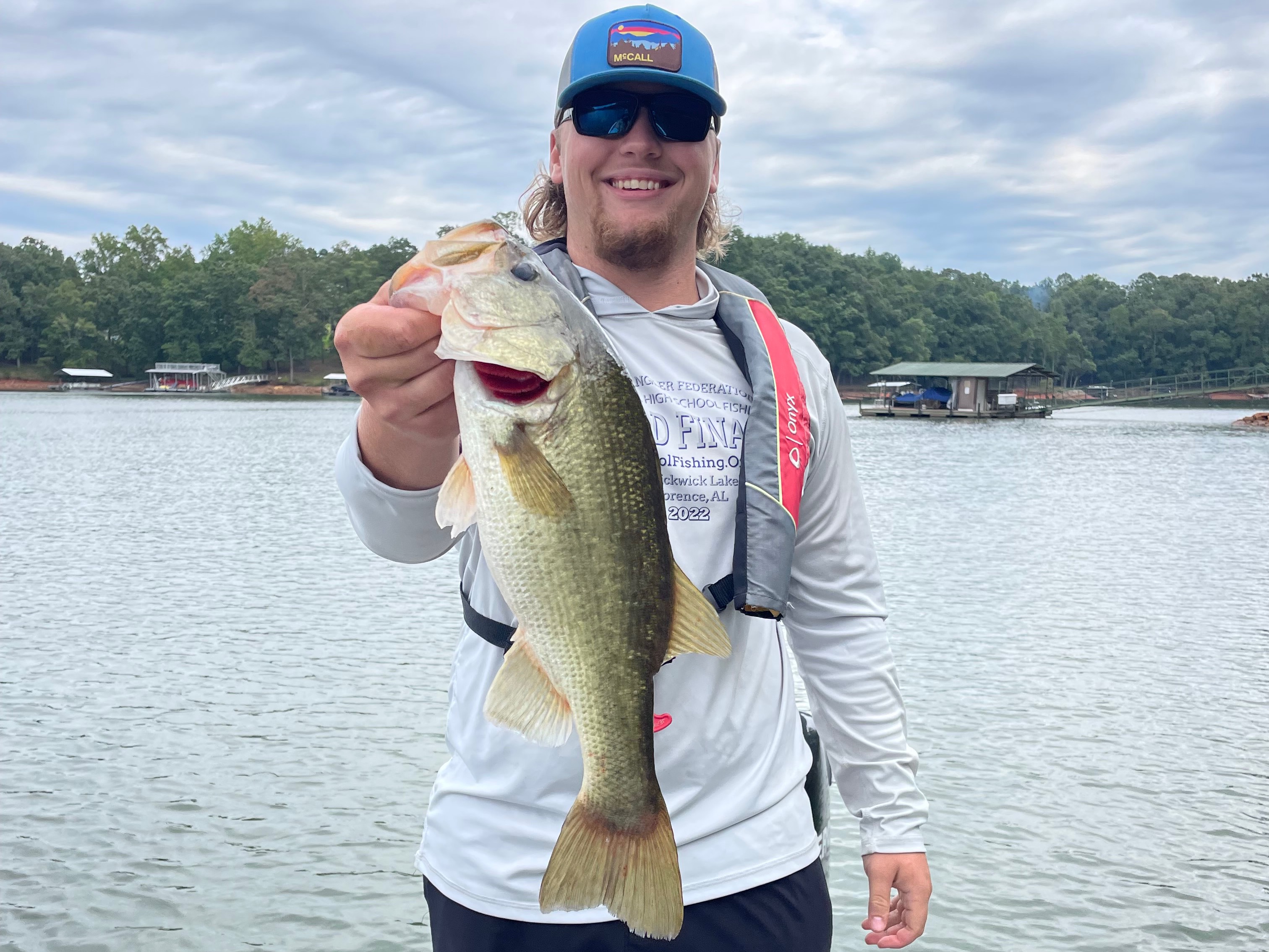 Isaac Greene holding a [object Object]